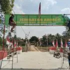 Sinergi Babinsa Koramil 411-04/TMJ, Kodim 0411/KM dan Warga Tuntaskan Pagar Pengaman Jembatan Aramco Punggur Utara